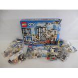 A boxed Lego no. 60141 City.