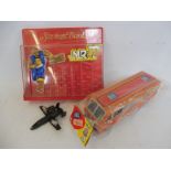 A Playtime friction drive toy, made in Japan, a Mr T savings bank and a Transformer.