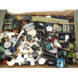A large quantity of Action Man accessories to include guns, webbing, helmets etc.