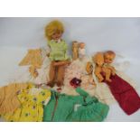 A box of circa 1940s dolls and clothing.