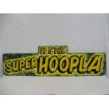 A fairground brightly coloured wooden sign 'It's The Super Hoopla', 72 x 21".