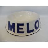 A Melox enamel dog food bowl.