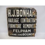 An enamel sign advertising H.J. Bonham, Haulage Contractor and Furniture Remover Felpham, Bognor,