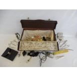 A travelling doctor's bag, with a number of medical and dentistry instruments inside, circa 1950s or