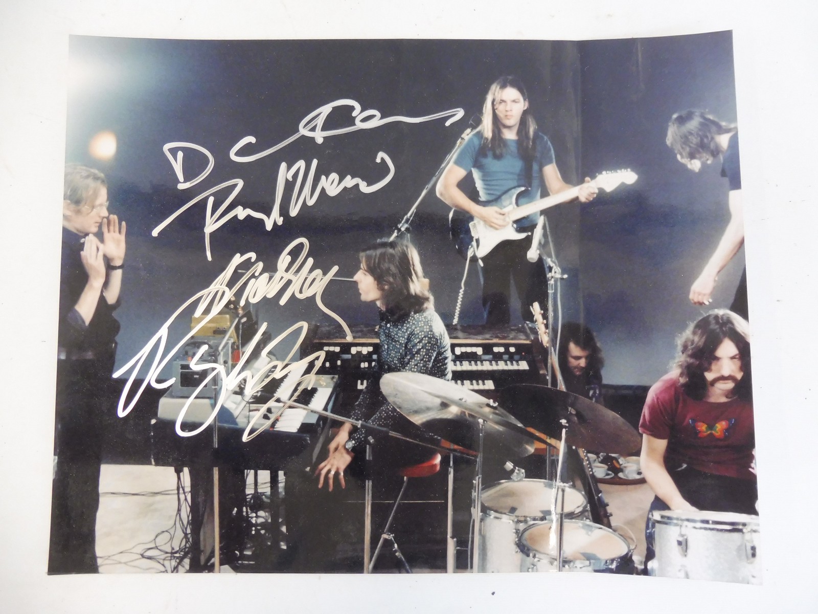 A fully signed Pink Floyd early image, signed by Dave Gilmour, Richard Wright, Nick Mason and