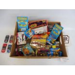 A mixed box of die-cast vehicles, mixed makers including Siku.