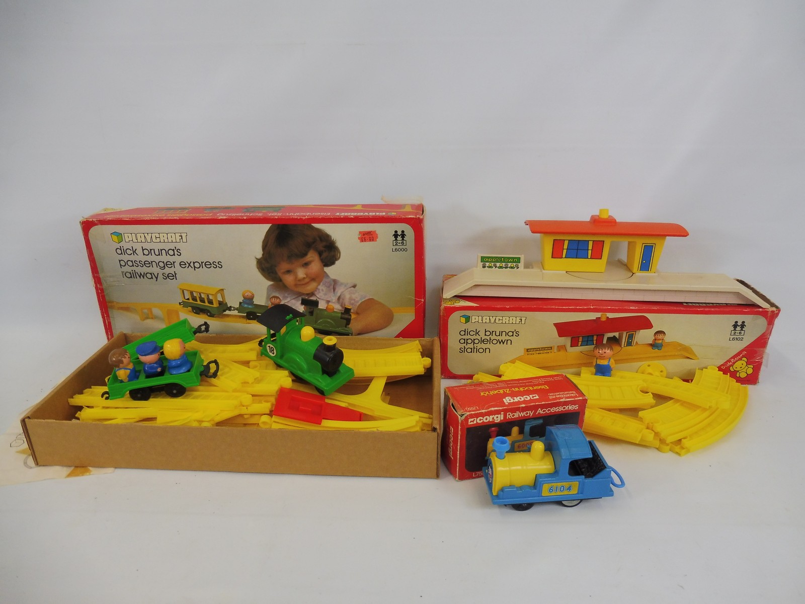 Three boxed 1970s Playcraft to include Dick Brunas passenger and railway set.