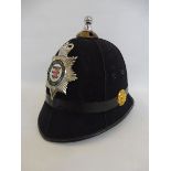 A cork lined circa 1950s Avon and Somerset Constabulary helmet complete with front enamel badge,