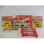 Five boxed carded and gift sets of emergency vehicles, various manufacturers including Marklin etc.