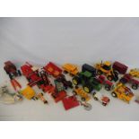 A large quantity of farm die-cast vehicles and accessories to include John Deere, Britains etc.