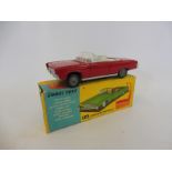 Corgi Toys no. 246 - Chrysler Imperial, model in near mint condition and golf clubs present, box has