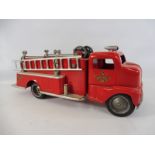 A first generation 'cab-over'- Tonka tinplate fire engine.