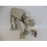 An original Star Wars AT-AT, missing parts and an original Tauntaun.