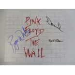 A later Pink Floyd 'The Wall' image bearing three signatures of Dave Gilmour, Nick Mason and Roger