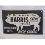 A Harris of Calne, Wilts pictorial enamel sign depicting a large pig to the centre, 30 x 18".