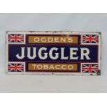 An Ogden's Juggler Tobacco rectangular enamel sign in very good condition, 22 x 10".