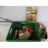 A box of assorted playworn oo scale railway to include engines, track and accessories.