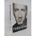 A Pete Townshend autobiography titled 'Who am I?' personally signed by Pete himself.