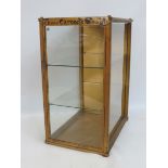 An unusual and rare Carsons Chocolates metal framed counter top display cabinet with two glass