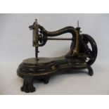 A Jones swan neck sewing machine.