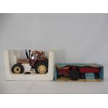 Two boxed Ertl die-cast tractors comprising the 18090 Turbo Fiat, and the International Tractor