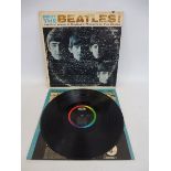 Meet the Beatles - USA pressing on Capital label, cover shows age and wear, vinyl is VG.