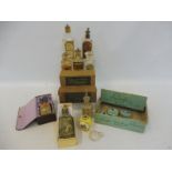A tray of assorted perfumes and cosmetics.