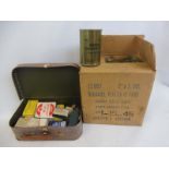 A selection of assorted medical packaging including a box of new old stock bandages, plaster of