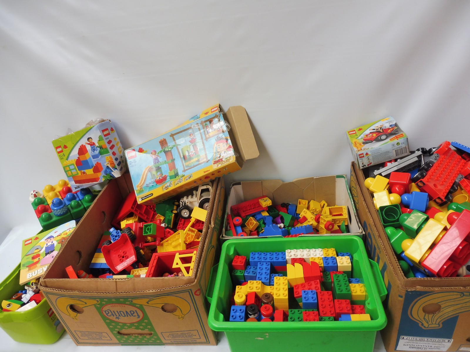 A large quantity of Duplo in five differentboxes including figures and sets.