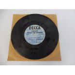A rare Tommy Steele advanced test recording on Decca label, the vinyl is in poor condition,