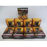 Nine boxed Eagle Moss Collections models 'Walking Dead'.