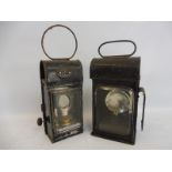 A Howls & Burley Ltd 1917 railway lamp and one other.