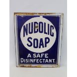 A double sided enamel chair back sign, to one side advertising Nubolic Soap, and Watson's