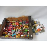 A box of predominantly Lesney Matchbox vehicles, all playworn.