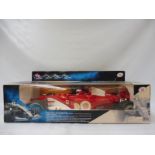 A boxed 1:6th scale remote control formula one racing car, never played with.