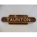 A totem style handpainted sign for 'Taunton', 36 1/2 x 10 1/2".