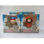 Two boxed South Park figures: Kenny and Stan.