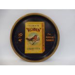 An early Ogden's Robin Cigarettes circular tin tray in very good original condition.