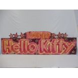 A fairground brightly coloured wooden sign 'Look It's Hello Kitty', 72 x 22".