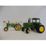 Two John Deere 1:16 scale die-cast farm vehicles, one boxed.