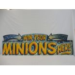 A fairground brightly coloured wooden sign 'Win Your Minions Here', 68 1/2 x 21".