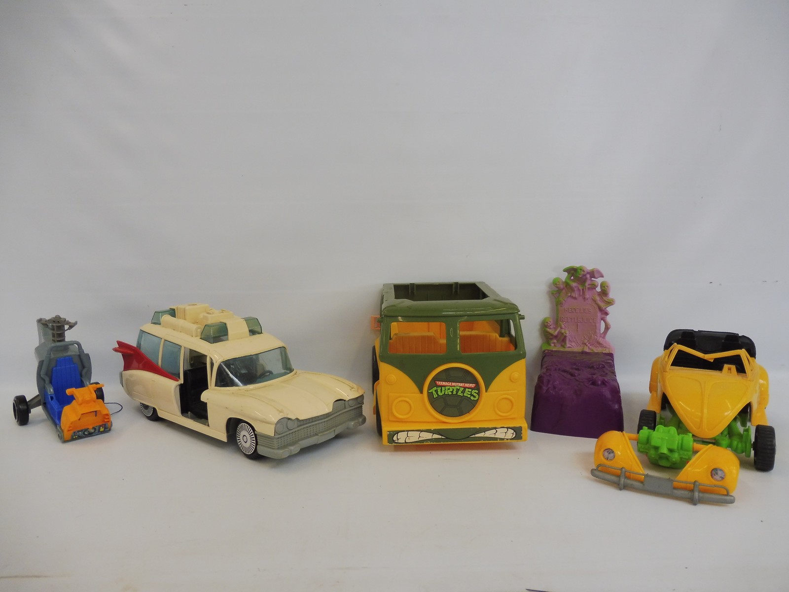 Two boxes of various vehicles to include Teenage Mutant Ninja Turtles, Ghostbusters, Action Force - Image 4 of 11