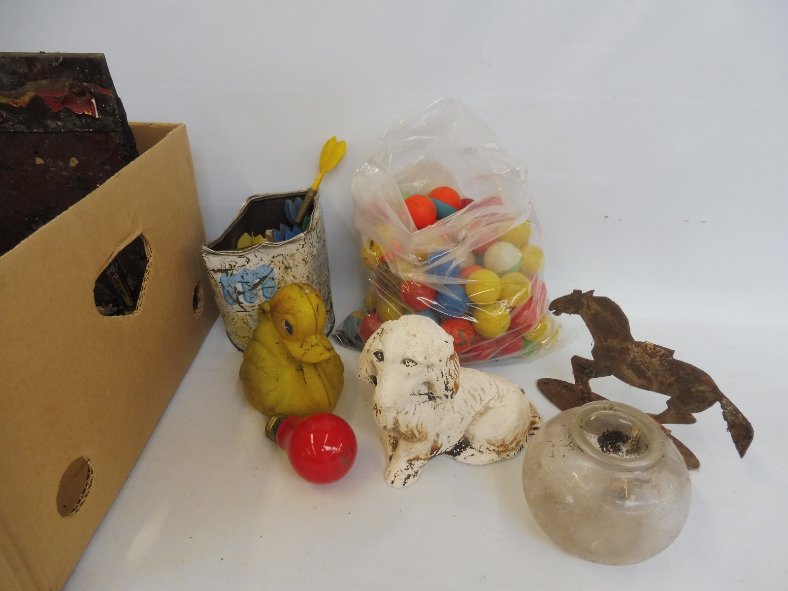 A quantity of original fairground items to include signs, shooting gallery accessories, fairground