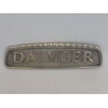 A Daimler aluminium radiator name plate, 15 1/4 x 4 1/4".