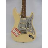 An Eric Clapton signed American made electric guitar bearing the name Fender Stratocaster, hand