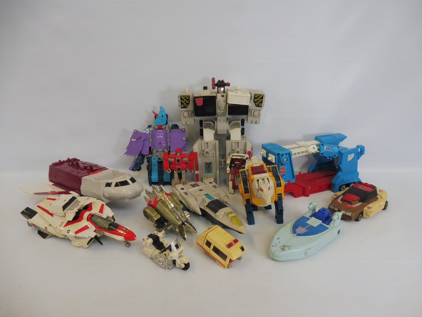 A collection of predominantly G1 and G2 Transformers, to include Jetfire.