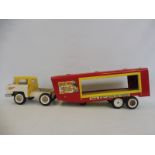 A Tri-ang Toys tinplate model of an articulated lorry in Hi-Way Big Top Circus livery.