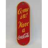 A rare Coca-Cola enamel finger plate in excellent condition, 3 1/2 x 11 3/4".