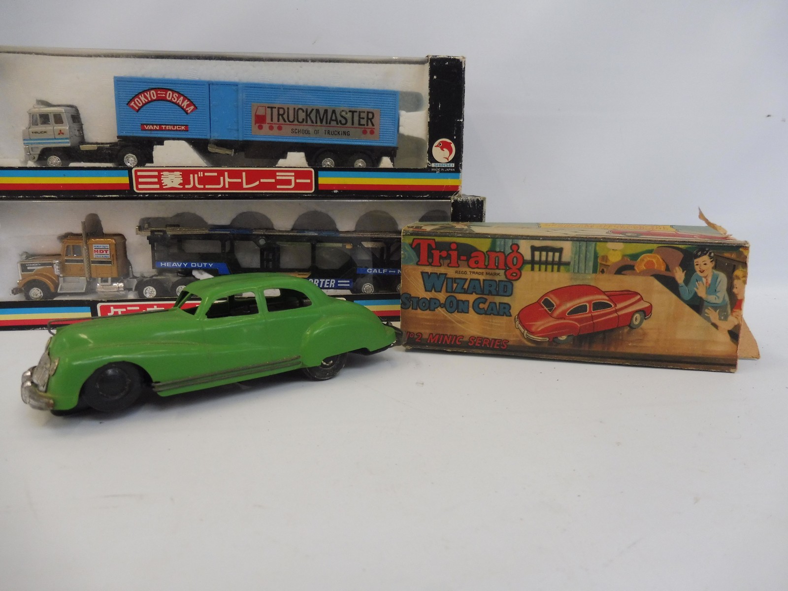 A boxed Tri-ang Wizard tinplate Spot-on-car no.2 series and two boxed super hauliers. - Image 2 of 3