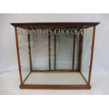 A Rowntree's Chocolates mahogany framed rear opening glass fronted counter top dispensing cabinet